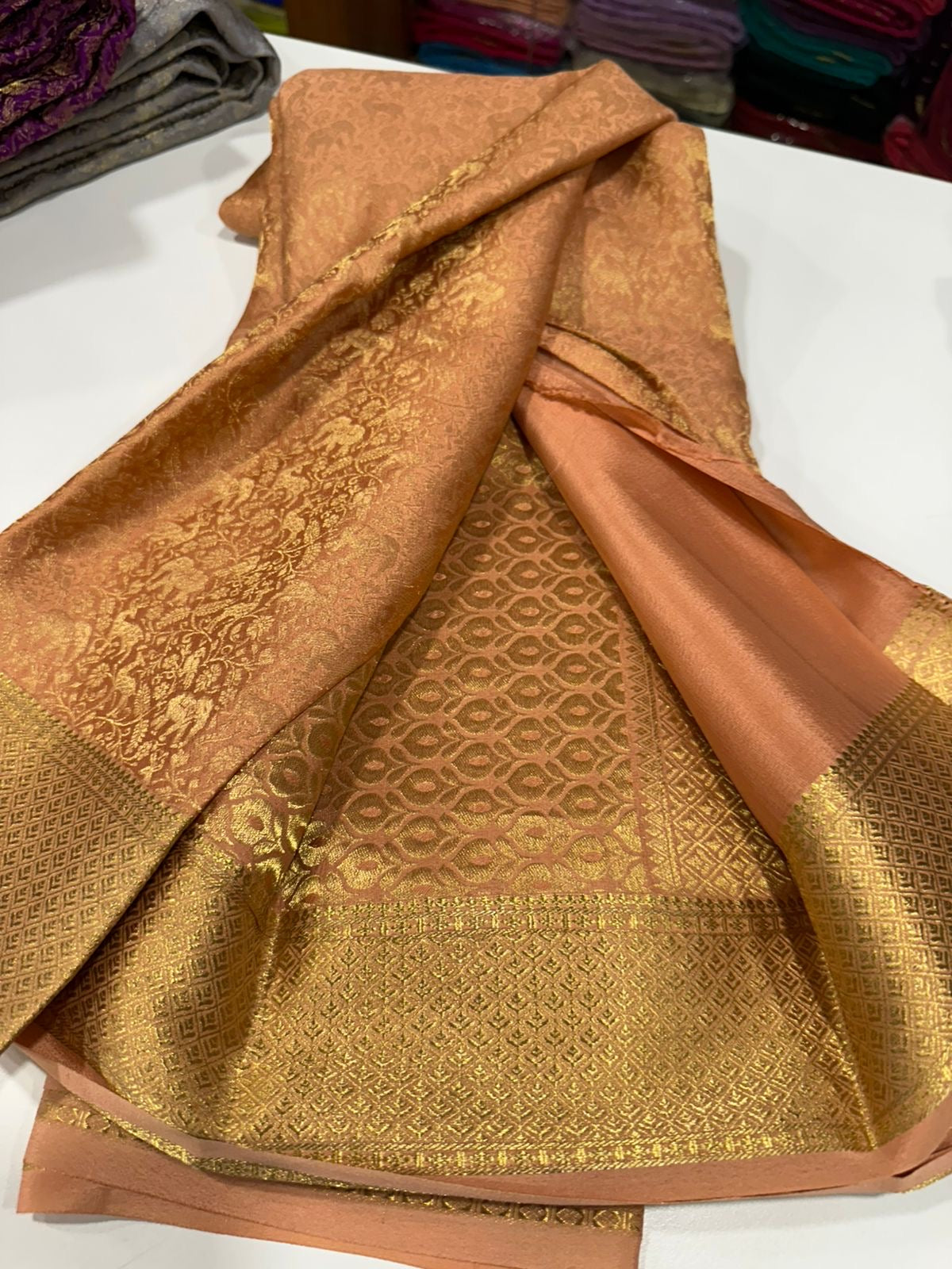 Beautiful Silk brocade fabric with zari weaving all over saree