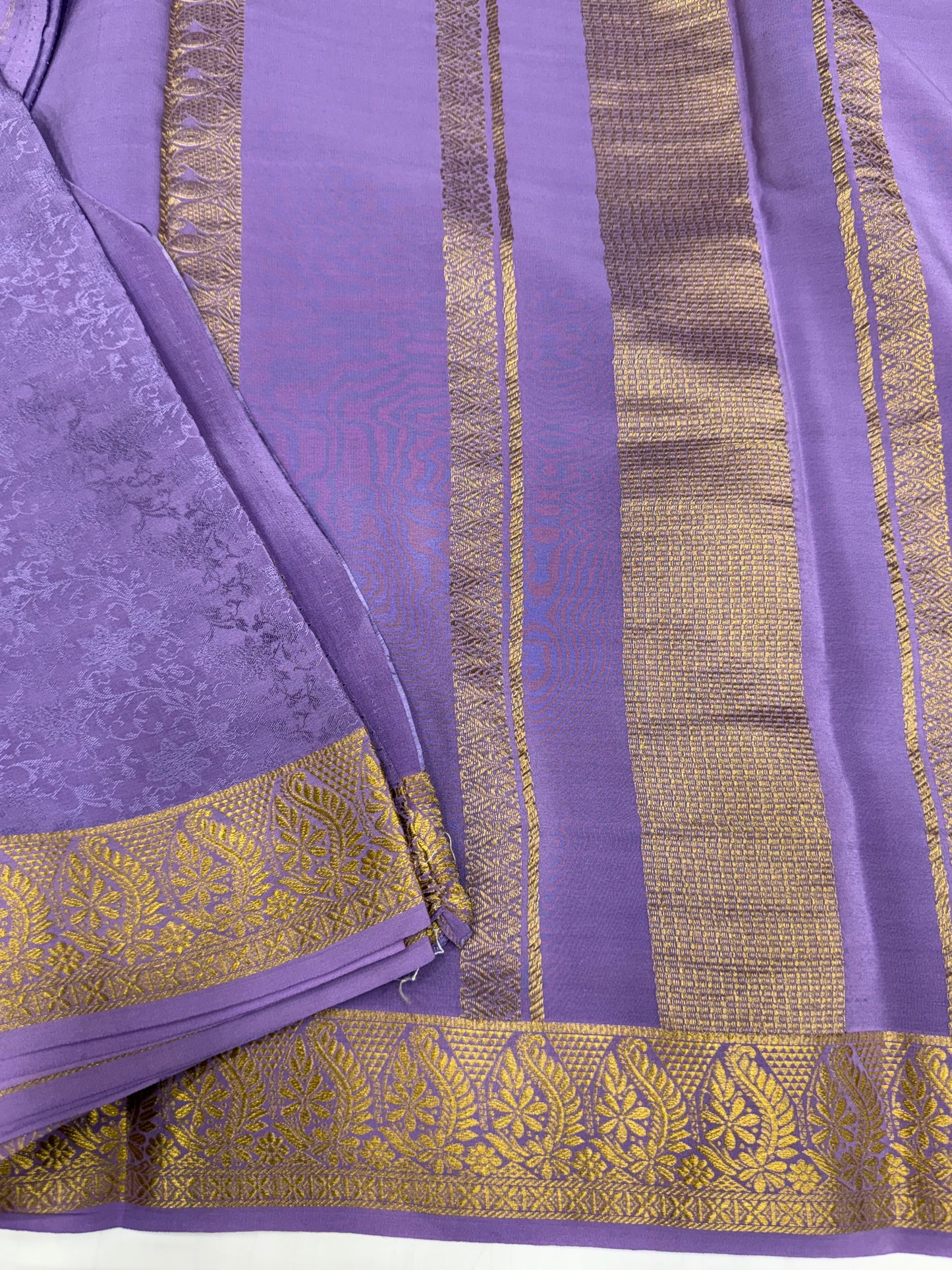 Embossed gold lace