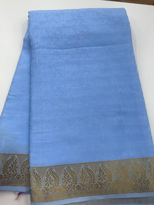 Embossed gold lace