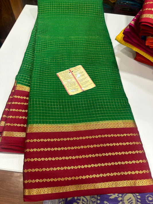 Small checks contrast with rich pallu
