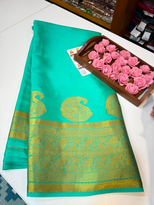 Mango motif peacock border with rich Pallu