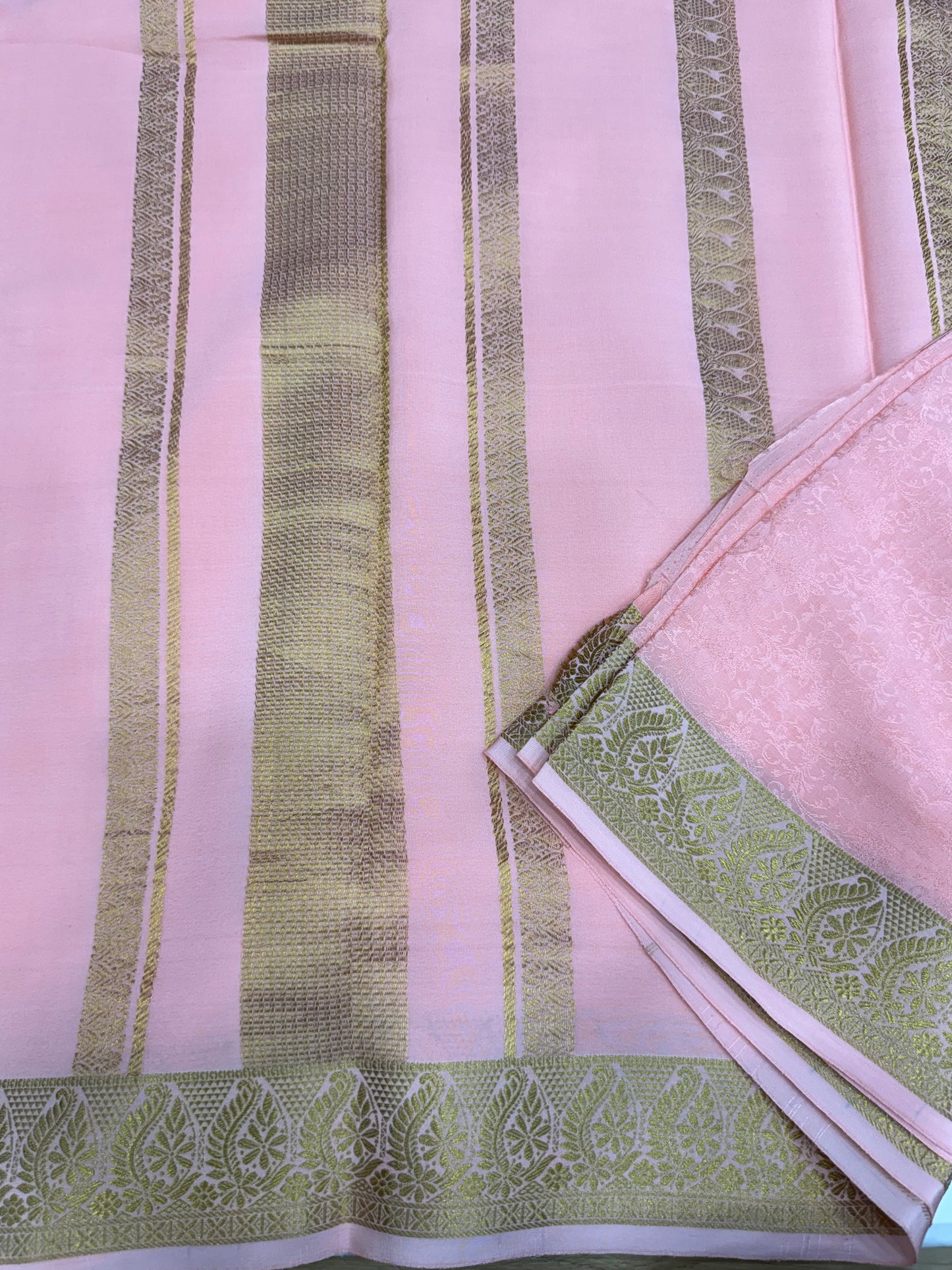 Embossed gold lace