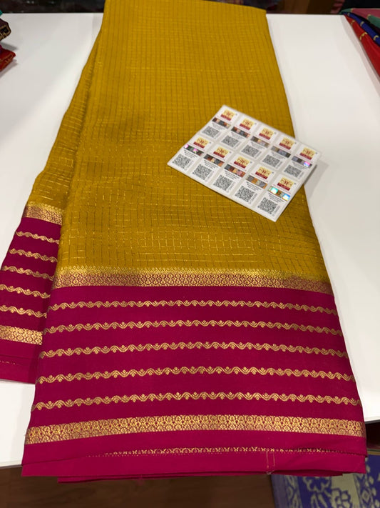 Small checks contrast with rich pallu