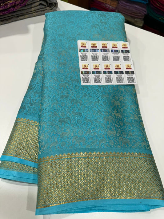 Beautiful Silk brocade fabric with zari weaving all over saree