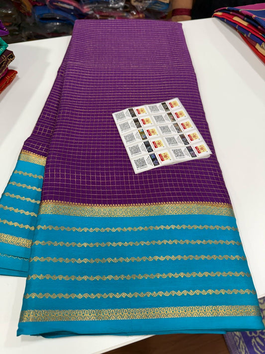 Small checks contrast with rich pallu