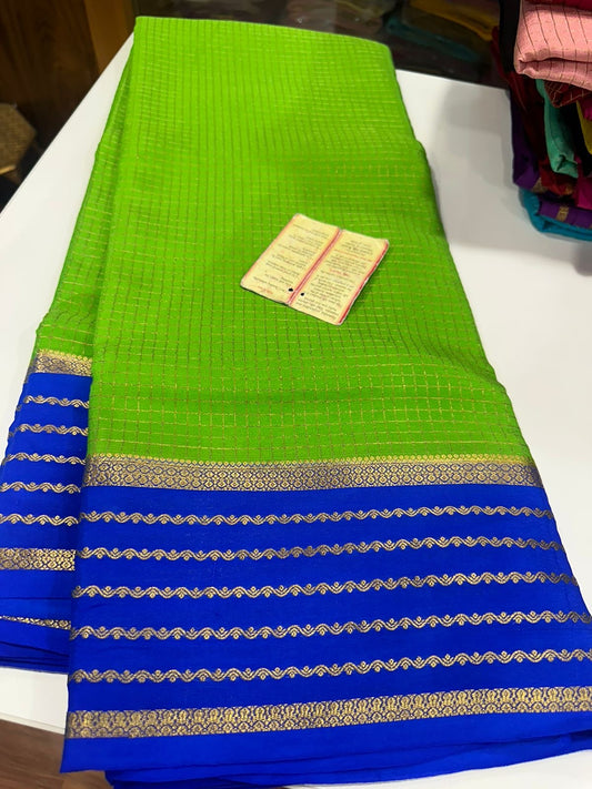 Small checks contrast with rich pallu