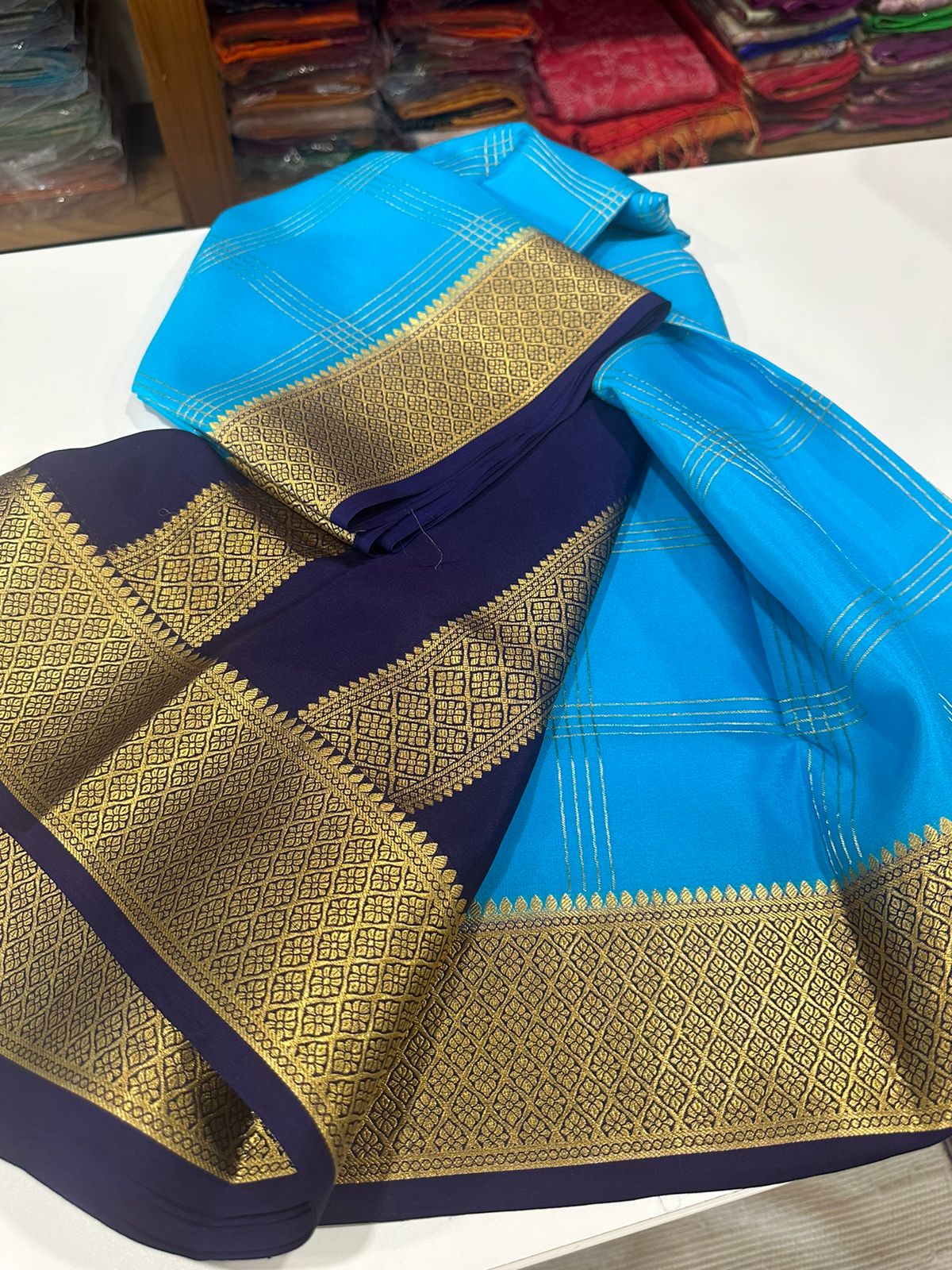 Double line checks pattern with rich Pallu